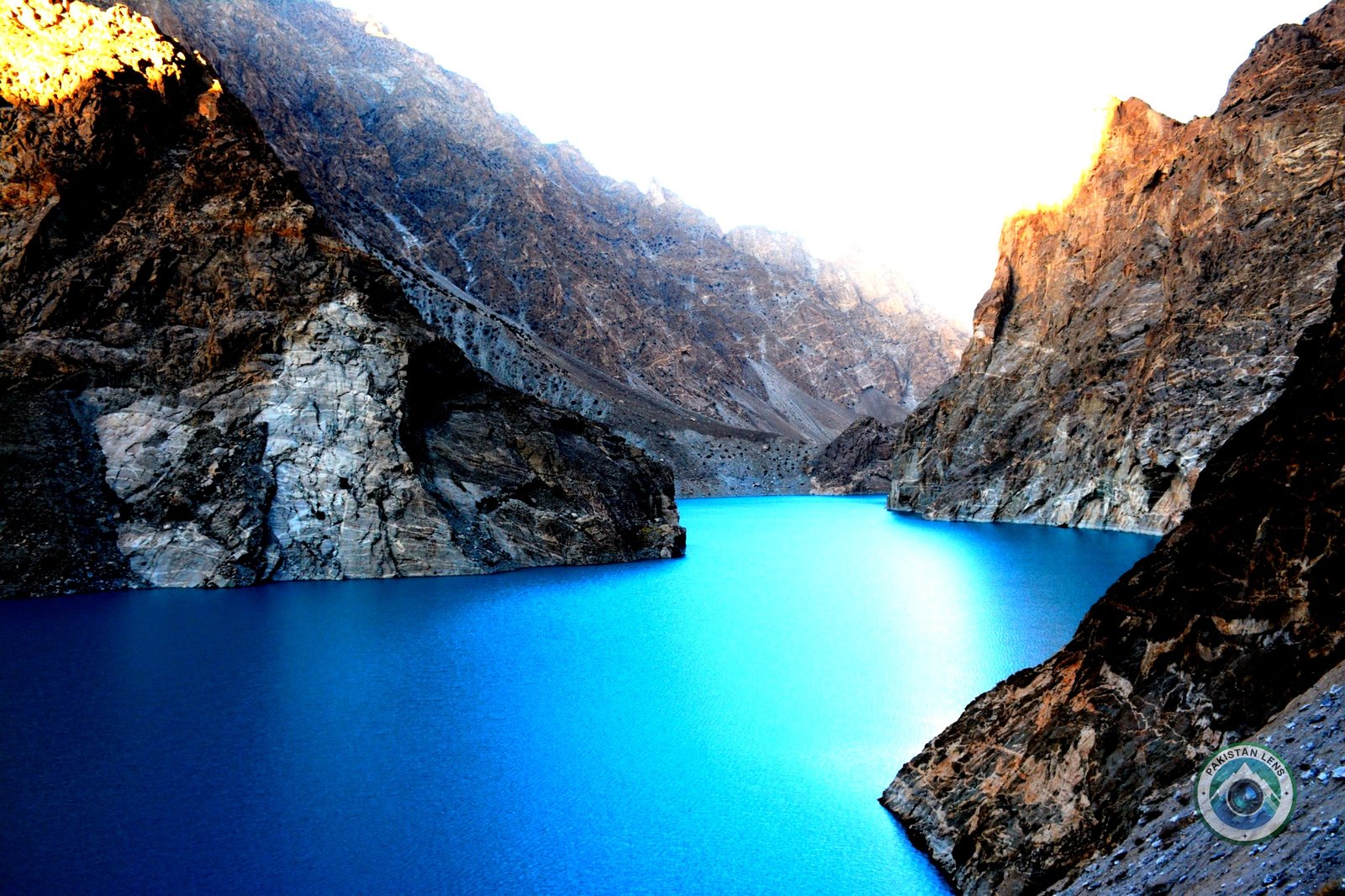 Attabad Lake with crystal blue water and dramatic mountain landscape in Hunza Valley, Gilgit-Baltistan, Pakistan