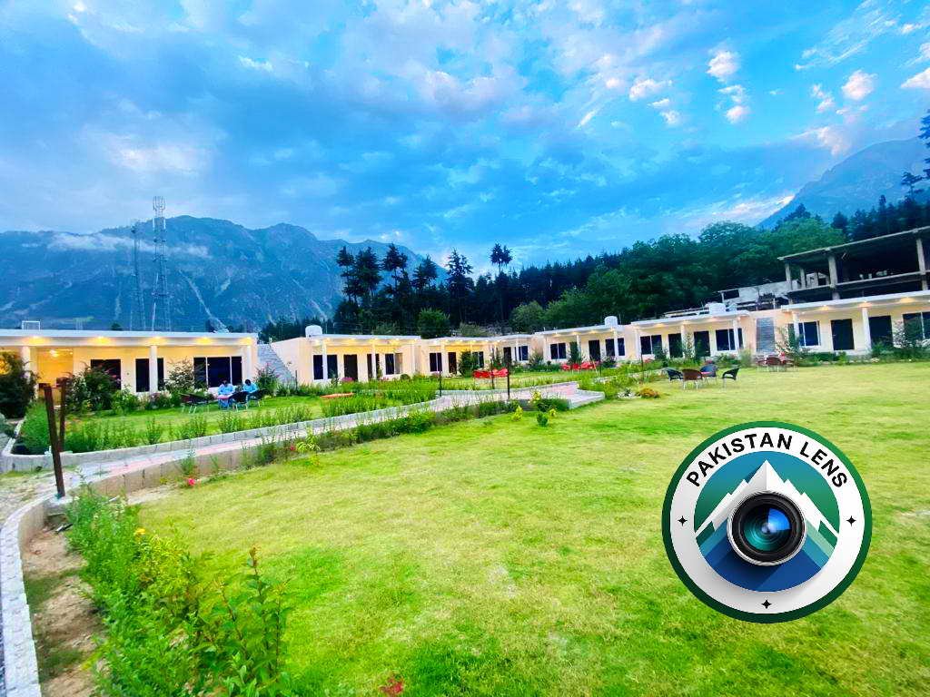 Panoramic view of Kalam Valley featuring lush green mountains and scenic landscapes.