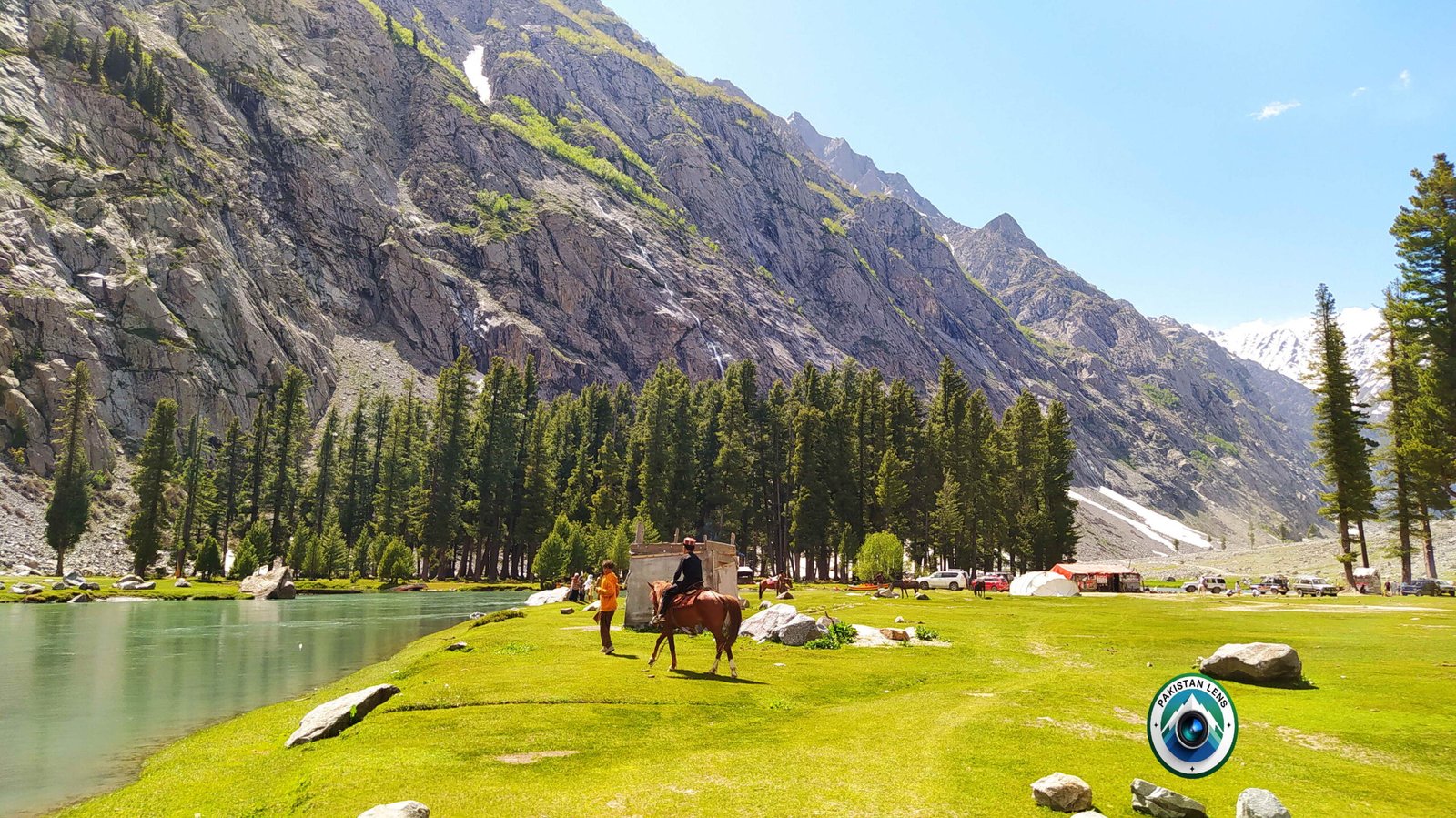 Forest reflections on the calm waters of Saif Ullah Lake in Kalam Swat