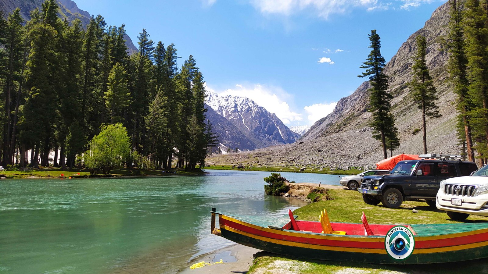 Boats resting along the shore of Saif Ullah Lake in Kalam Swat