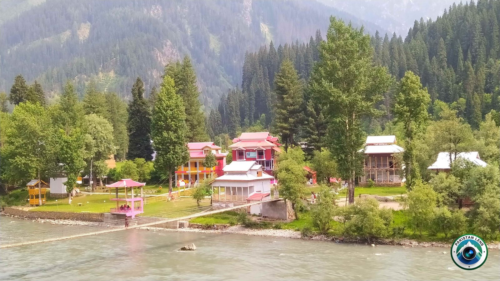
 Summer scenery of Taobat village surrounded by forests and mountains in Upper Neelum Valley
